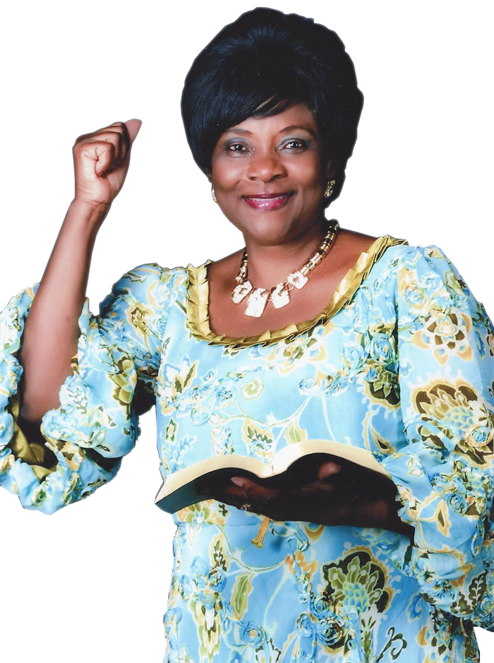 Rev. Prophetess Eunice Ade-Salu holding a Bible